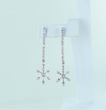 Boucles d'oreilles pendantes en forme de flocon de neige en or blanc 14 carats et diamants