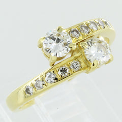 LADIES 14KT GOLD BYPASS DIAMOND RING SIZE 6.5
