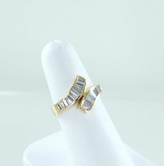 14KT YELLOW GOLD BAGUETTE WHITE STONES BYPASS RING SIZE 7.5