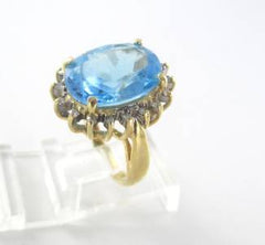 14KT SOLID YELLOW GOLD RING BLUE TOPAZ 18 DIAMONDS .18 CARAT 6.0 GRAMS JEWELRY